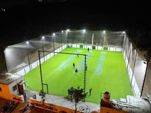 A caged box-cricket ground